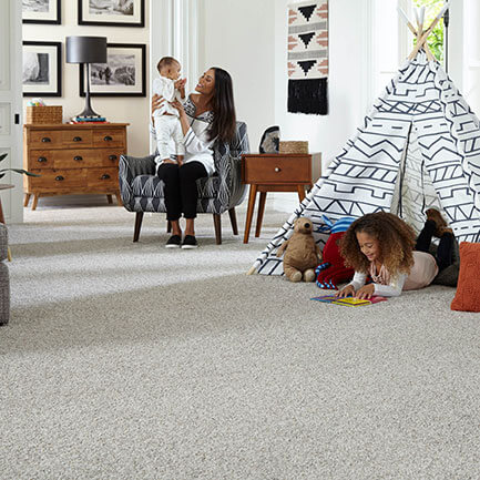 Family playing on carpet | Flooring 101