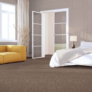Bedroom carpeting with a yellow chair | Flooring 101