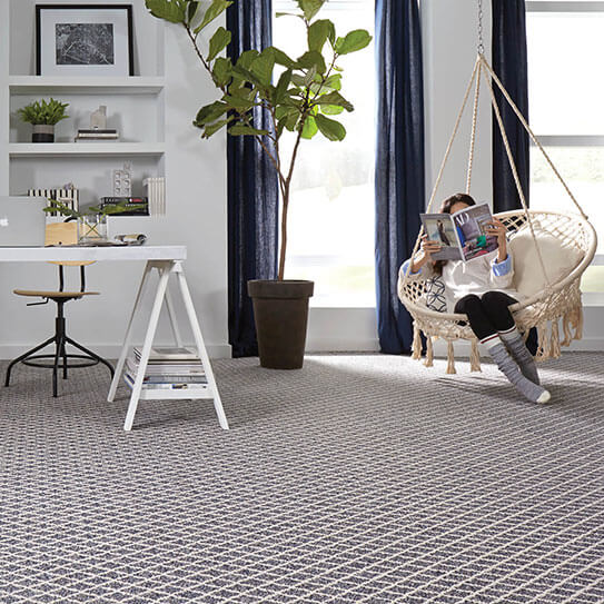Carpeted room with hanging chair | Flooring 101